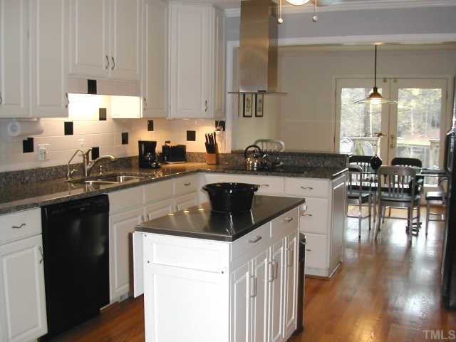 8925 Oneal Road Raleigh, NC 27613 - Photo 5 of 11 Beautifully Updated Kitchen with Granite Counter Tops and Hardwood Floors