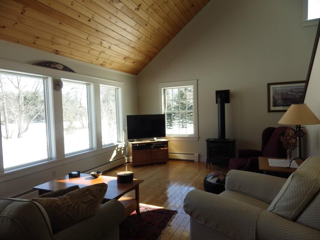 20 Spaulding Point Road Belgrade, ME 04917 - Photo 7 of 32 Living room with wood floors,...
