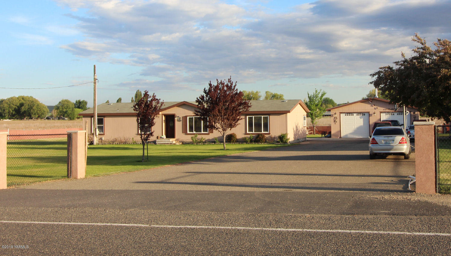 740 Barker Road Granger, WA 98932 - Photo 1 of 19 a view of a house with a street