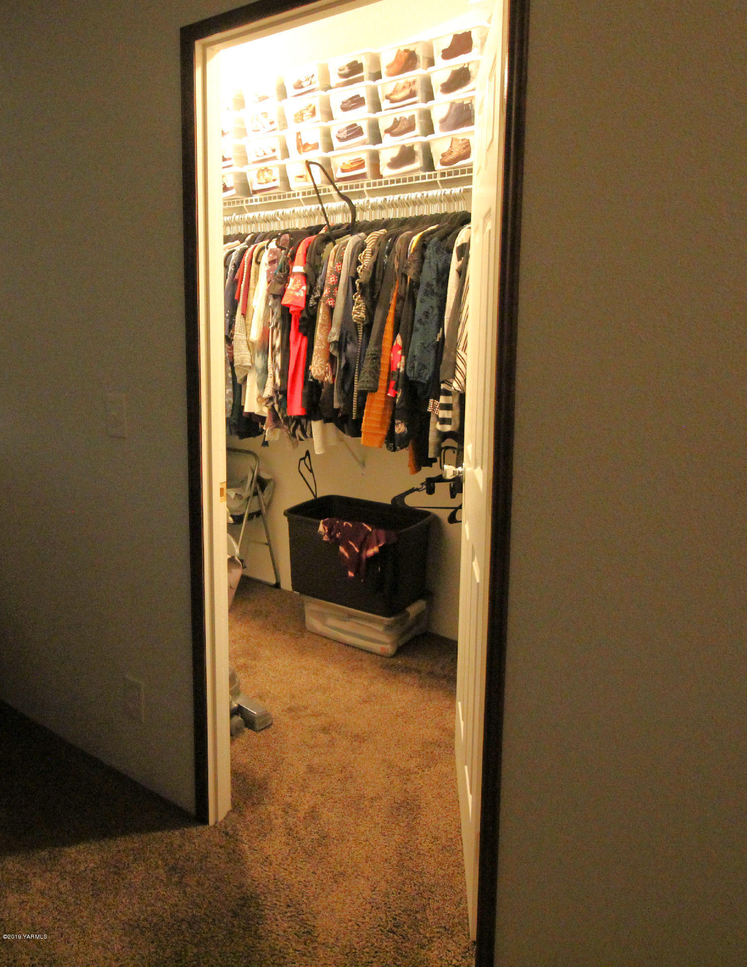 740 Barker Road Granger, WA 98932 - Photo 12 of 19 a view of walk in closet with clothes