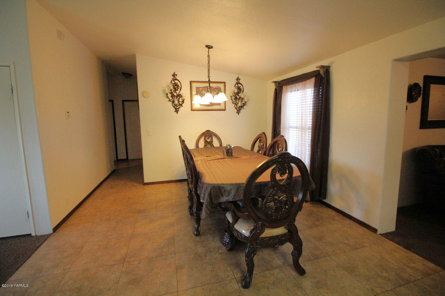 740 Barker Road Granger, WA 98932 - Photo 3 of 19 a view of a dining room with furniture window and wooden floor