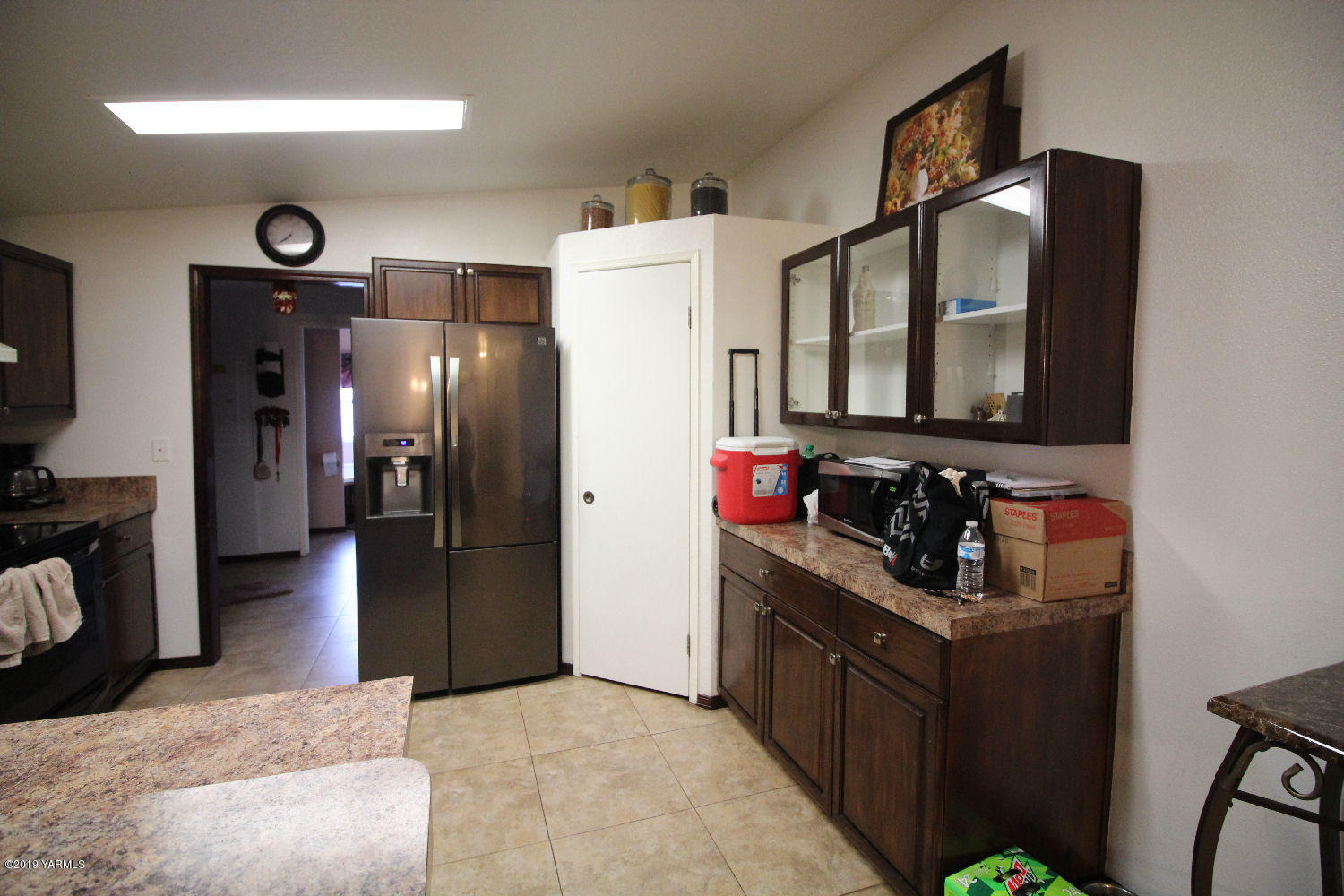 740 Barker Road Granger, WA 98932 - Photo 5 of 19 a kitchen with stainless steel appliances granite countertop a refrigerator and a sink