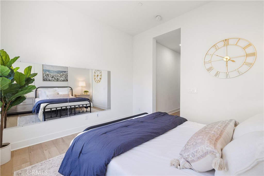 28346 Old Spgs Road Castaic, CA 91384 - Photo 35 of 80 a bedroom with a bed and a painting on the wall