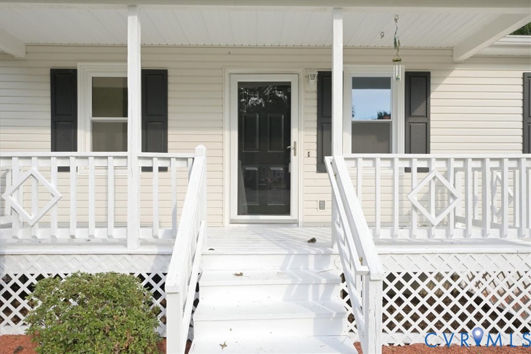21103 Rabbit Run Petersburg, VA 23803 - Photo 5 of 27 Inviting front porch with white railings, steps, a
