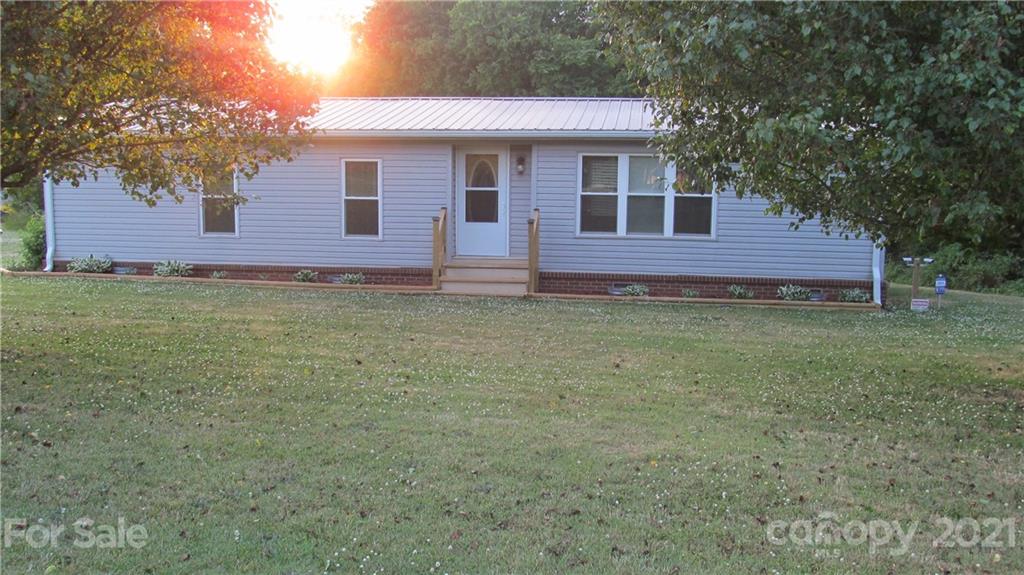 2896 Elbow Road Newton, NC 28658 - Photo 1 of 25 a view of a house with a yard