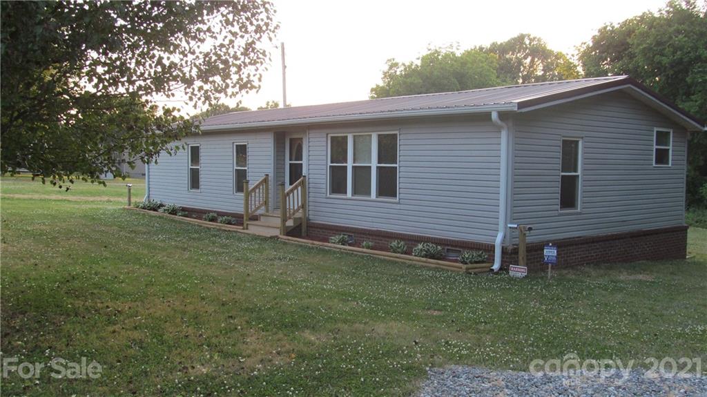 2896 Elbow Road Newton, NC 28658 - Photo 2 of 25 a view of a house with a backyard