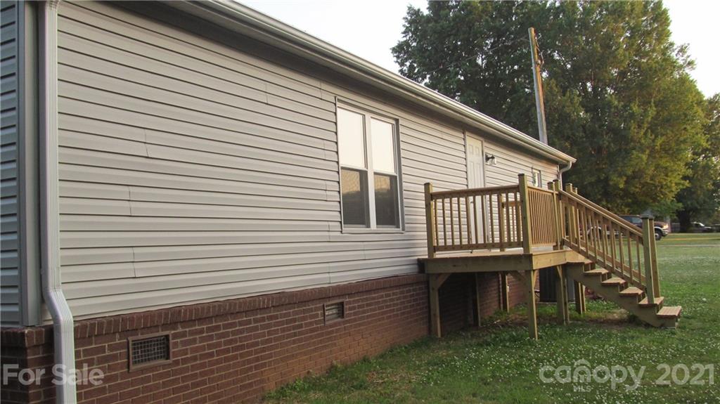 2896 Elbow Road Newton, NC 28658 - Photo 24 of 25 a view of a house with a yard and stairs