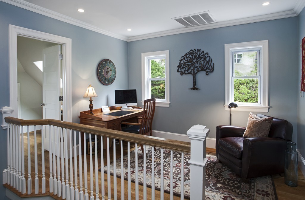 69 University Road, Unit 2 Brookline, MA 02445 - Photo 20 of 29 a living room with furniture and a window