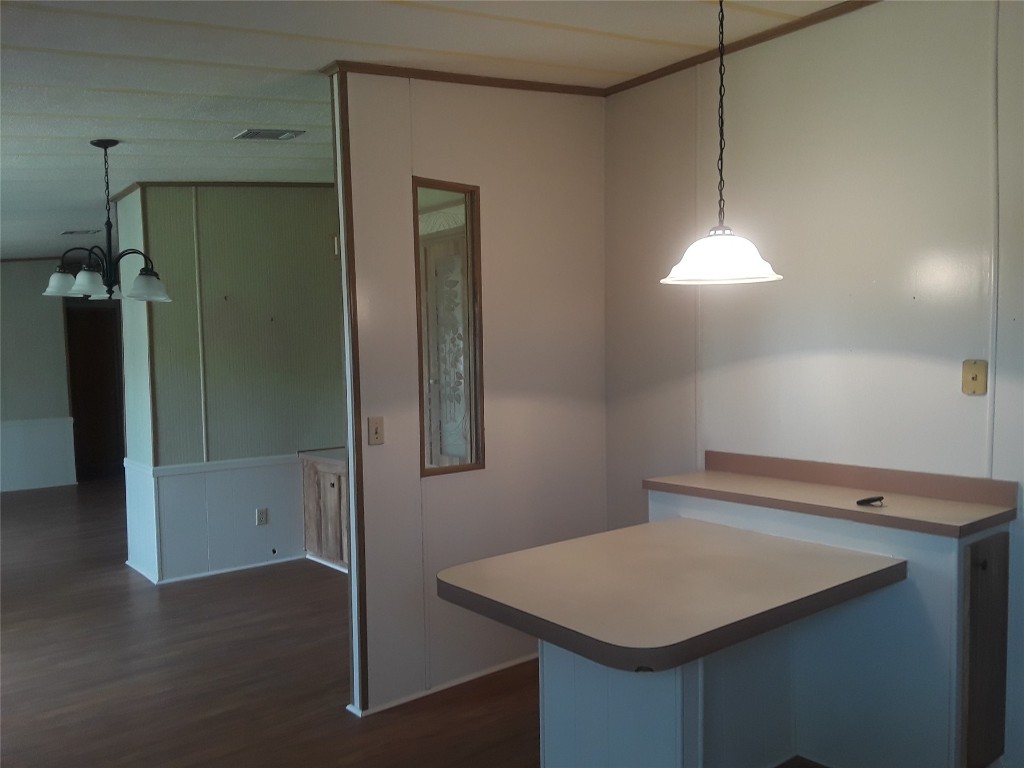 85112 Phillips Road Yulee, FL 32097 - Photo 14 of 17 a kitchen that has a island in it