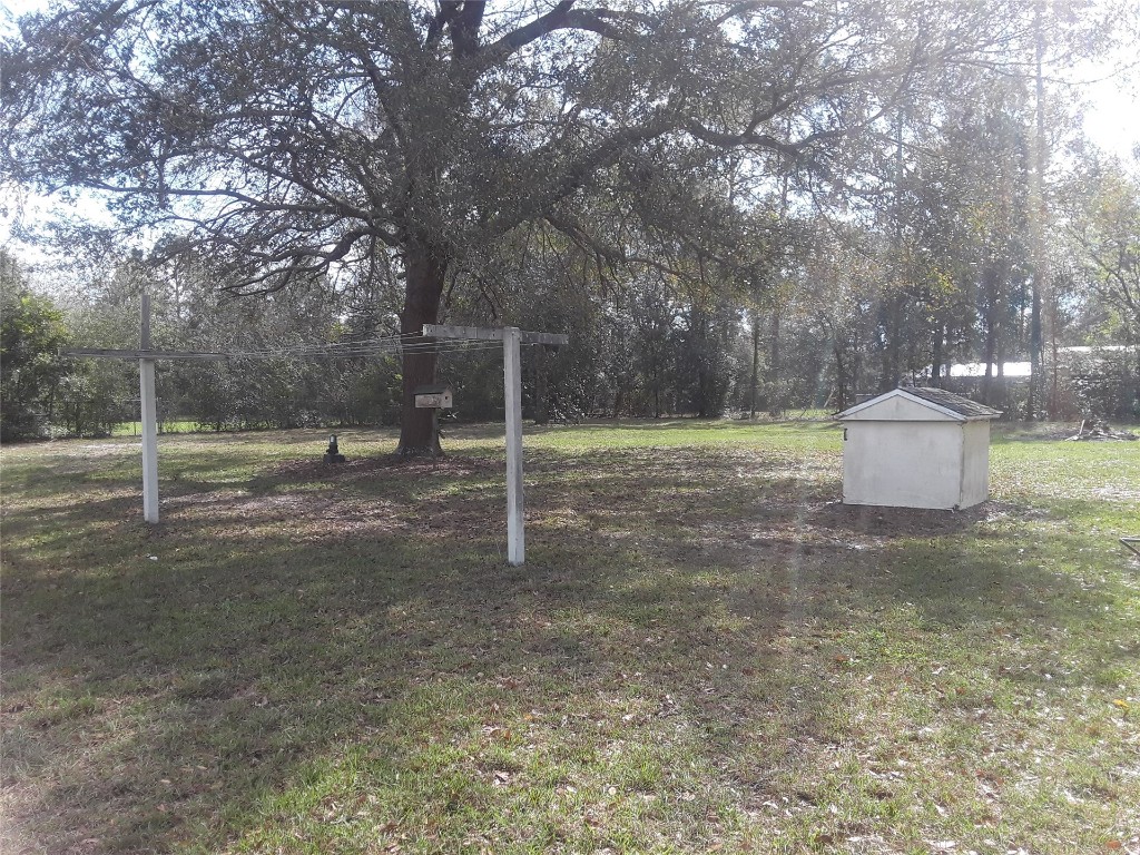 85112 Phillips Road Yulee, FL 32097 - Photo 17 of 17 a backyard of a house with entertaining space