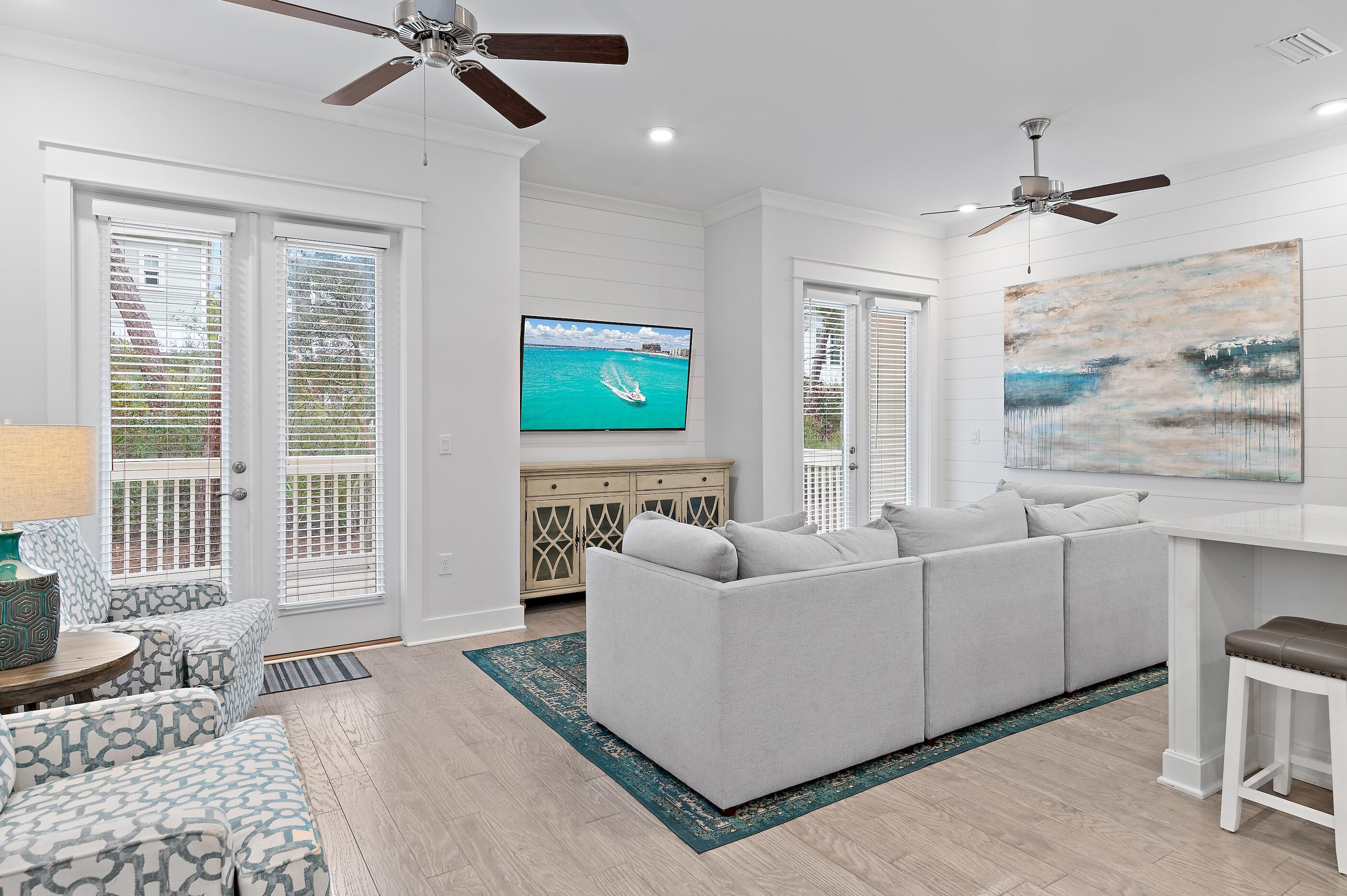 38 Pine Lands Loop East, Unit A Inlet Beach, FL 32461 - Photo 3 of 25 a living room with furniture and a window