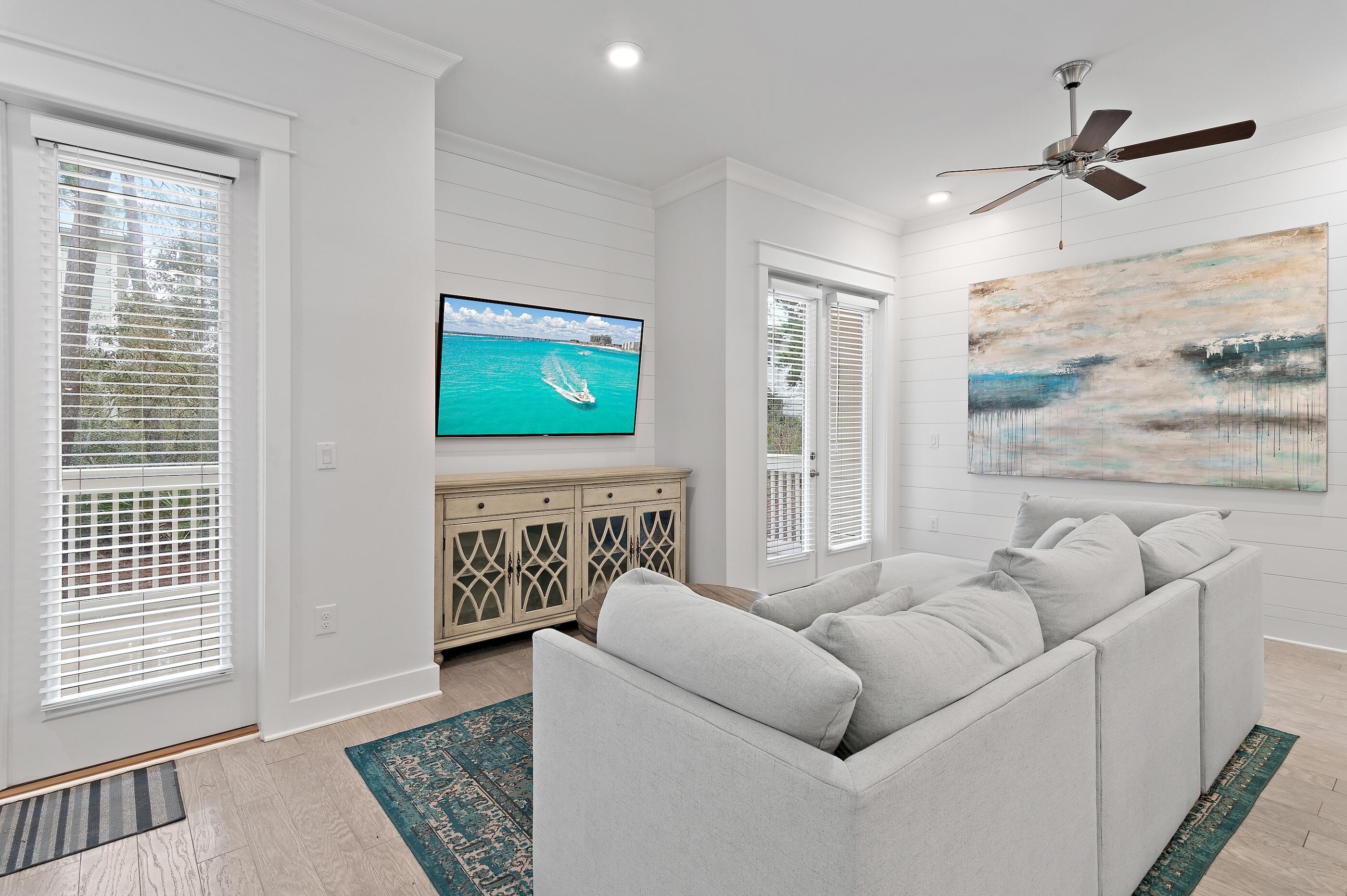 38 Pine Lands Loop East, Unit A Inlet Beach, FL 32461 - Photo 4 of 25 a living room with furniture and a window