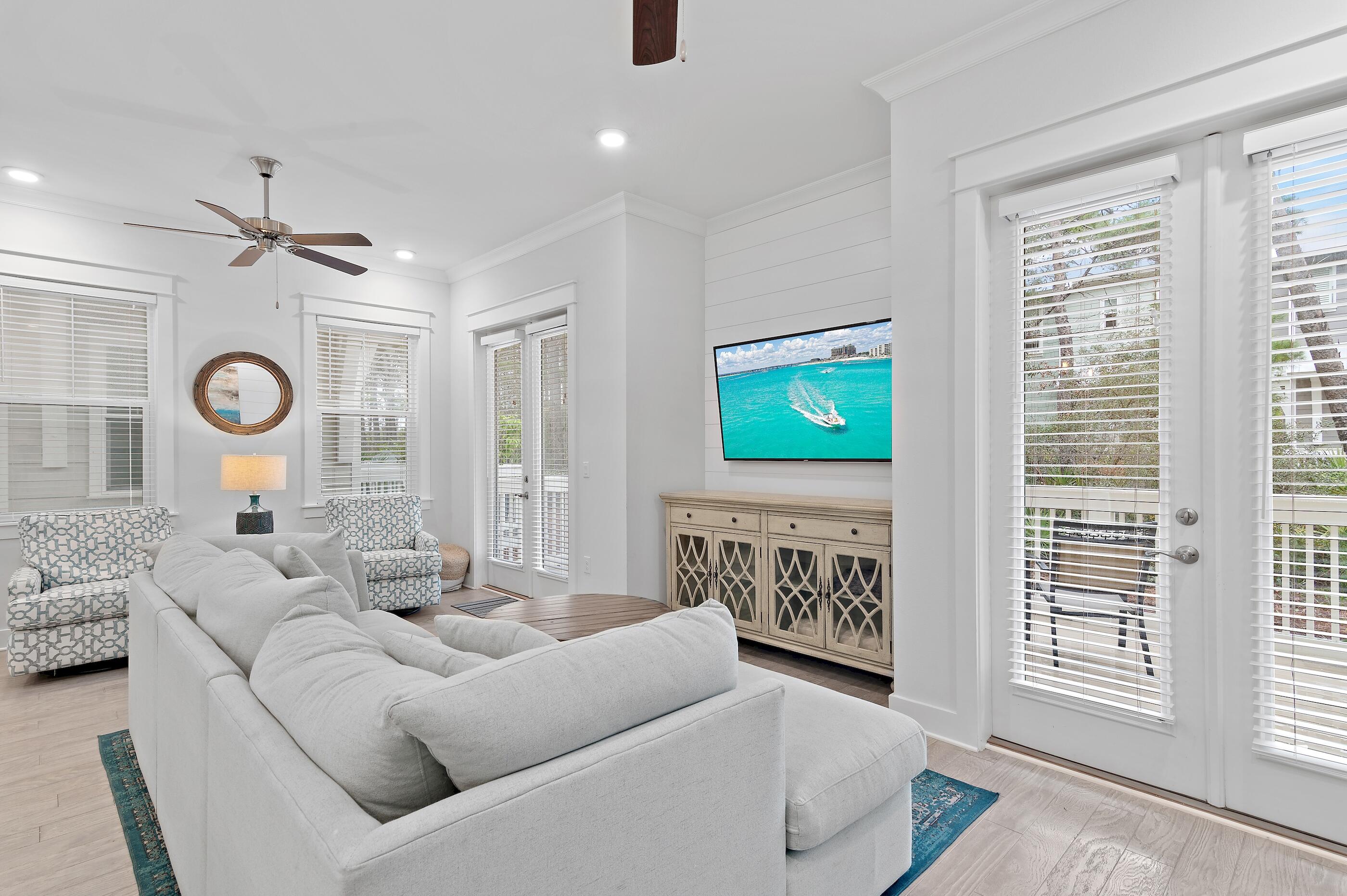 38 Pine Lands Loop East, Unit A Inlet Beach, FL 32461 - Photo 5 of 25 a living room with furniture and a window