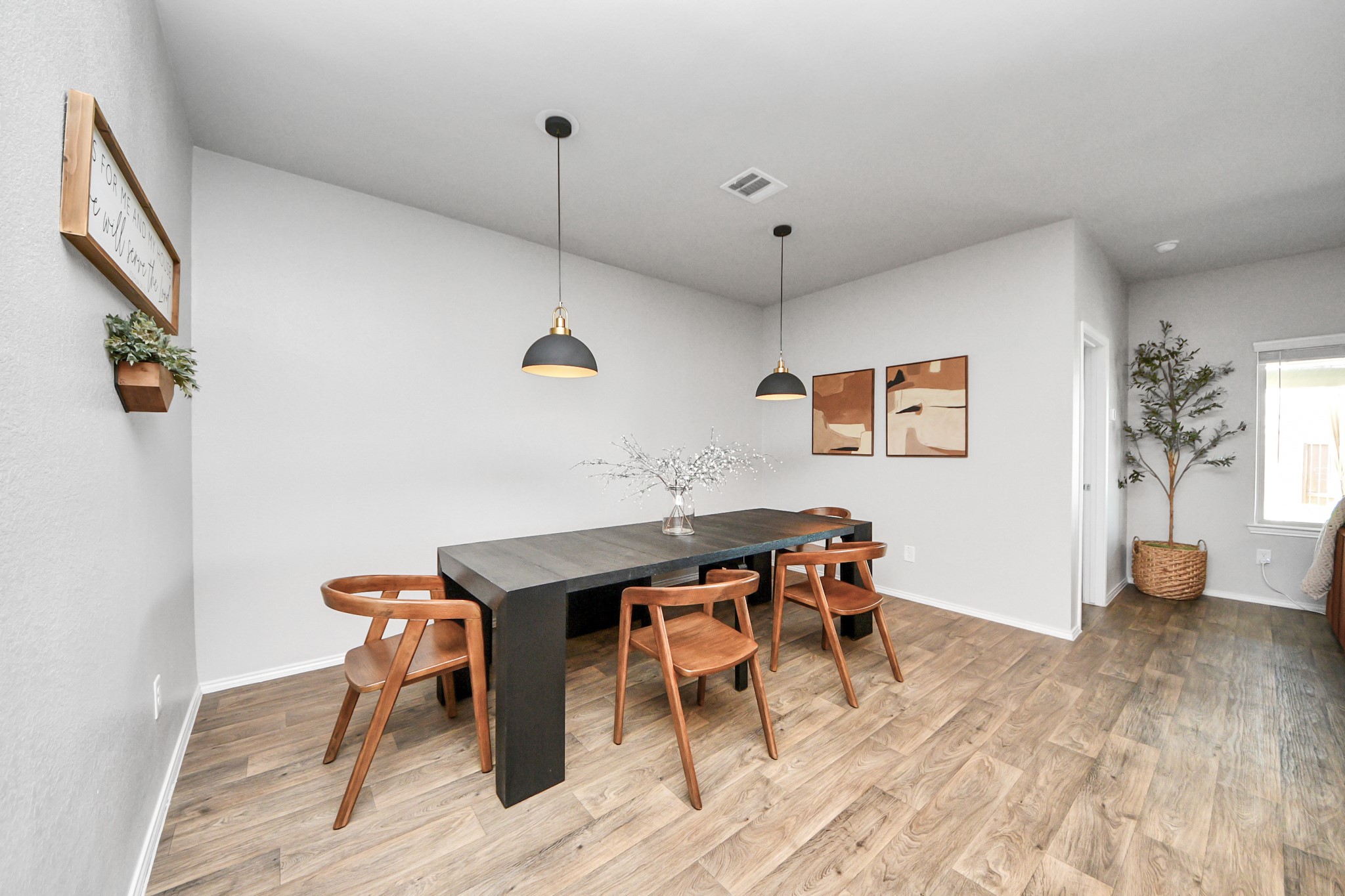 4315 Nervesa Dr. Katy, TX 77449 - Photo 20 of 41 a view of a dining room with furniture and wooden floor