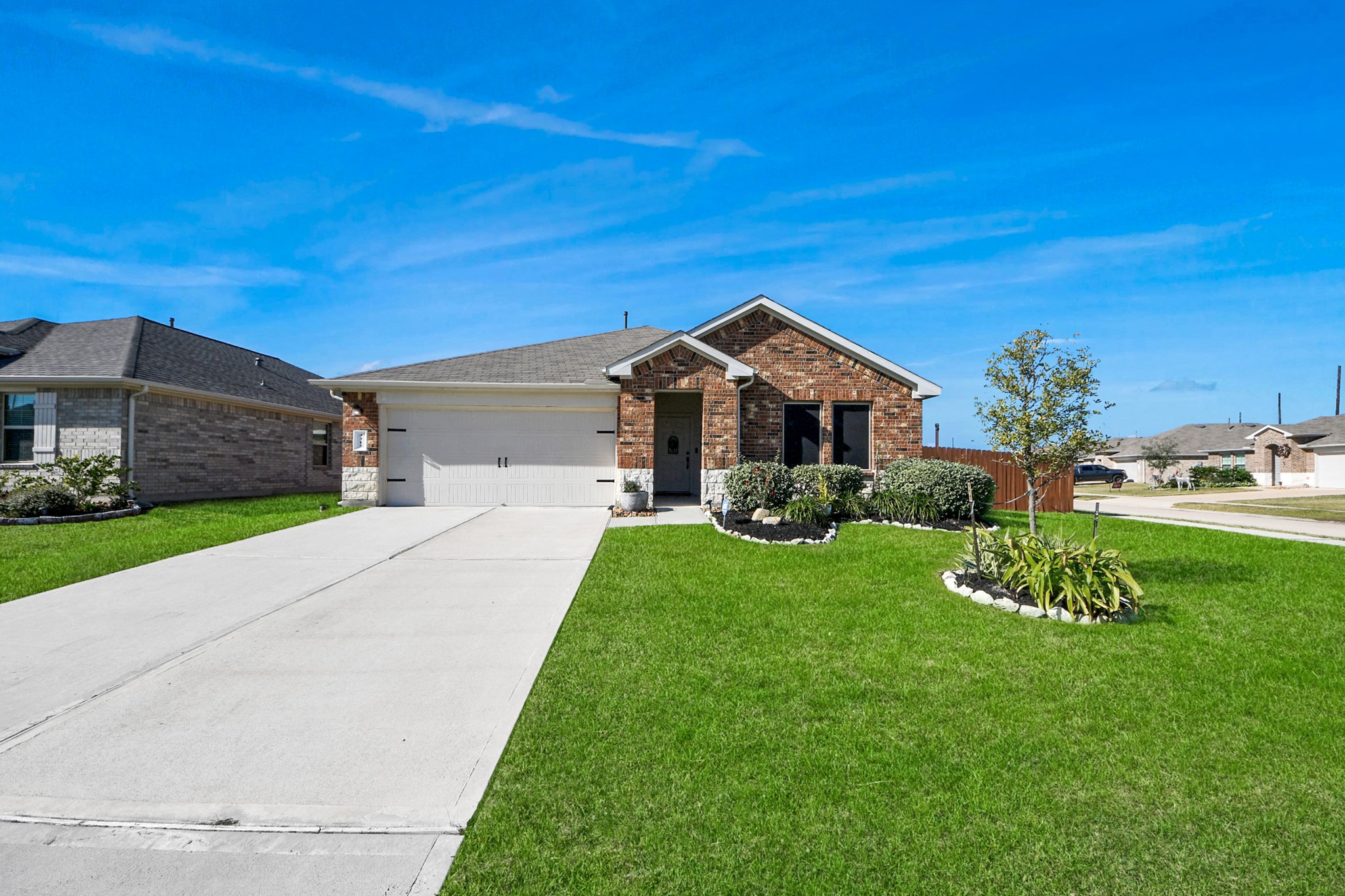 4315 Nervesa Dr. Katy, TX 77449 - Photo 2 of 41 a front view of a house with a yard