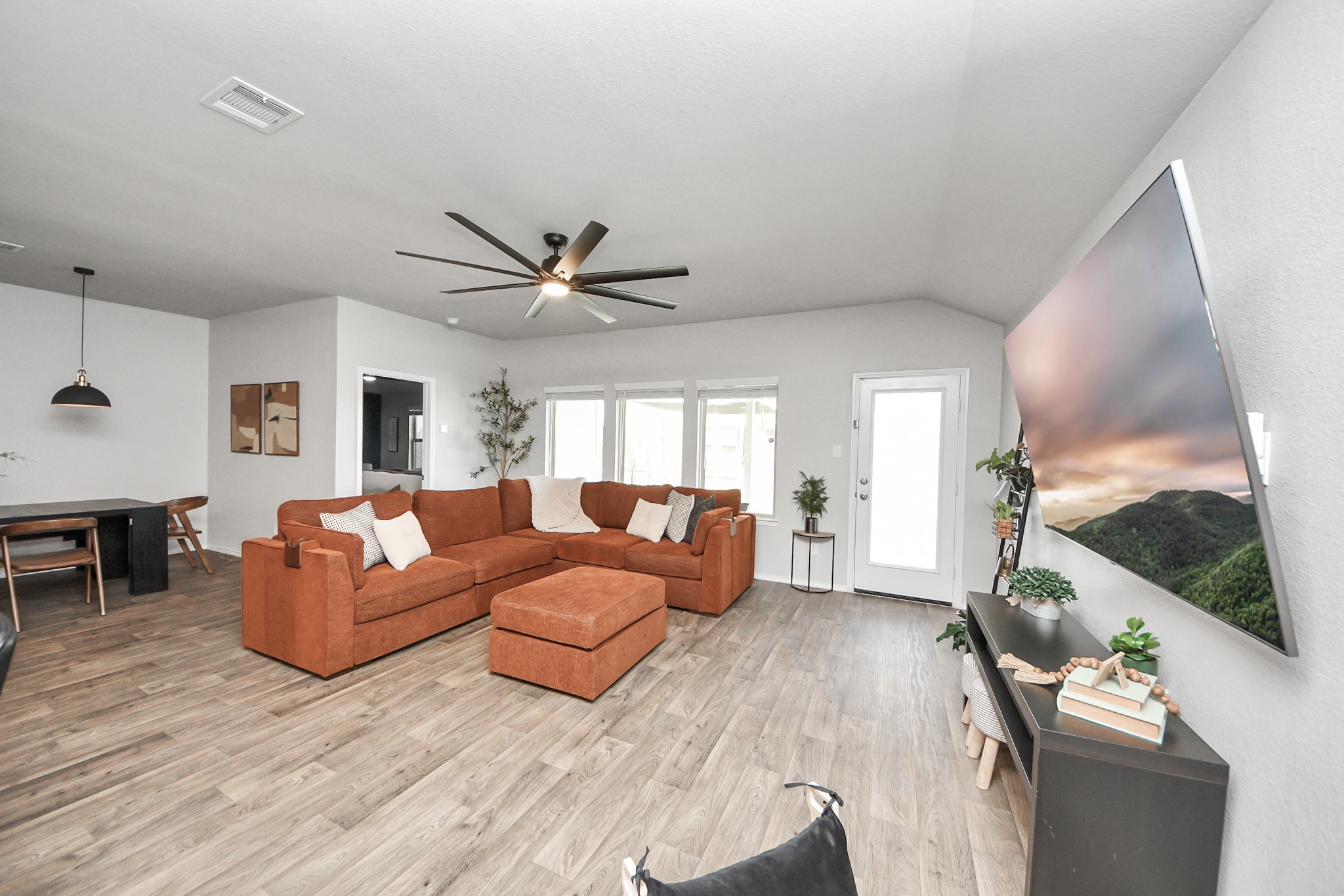 4315 Nervesa Dr. Katy, TX 77449 - Photo 24 of 41 a living room with furniture and a flat screen tv
