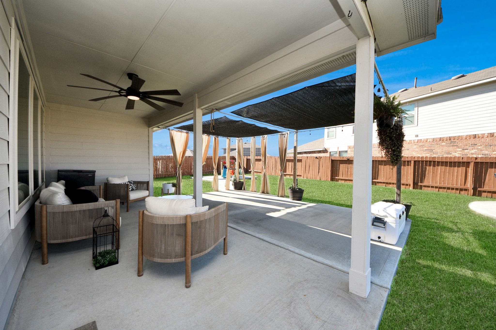4315 Nervesa Dr. Katy, TX 77449 - Photo 33 of 41 a living room with a floor to ceiling window and a table
