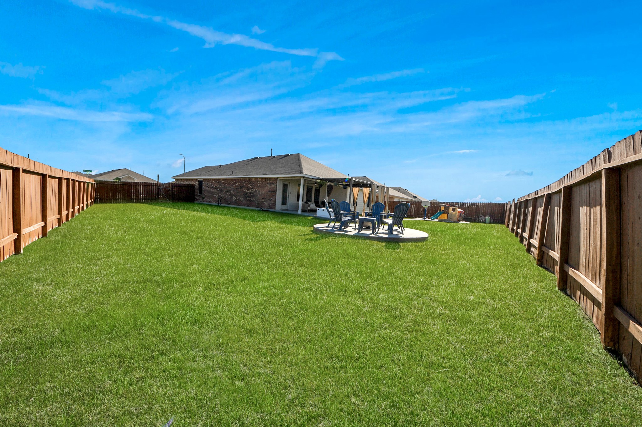 4315 Nervesa Dr. Katy, TX 77449 - Photo 34 of 41 a view of a yard with a house in the background