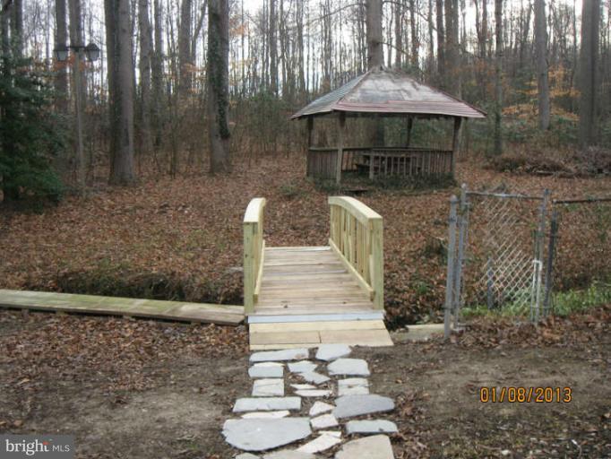 6808 Woodland Road Morningside, MD 20746 - Photo 5 of 11 Exterior (Bridge to Gazebo)