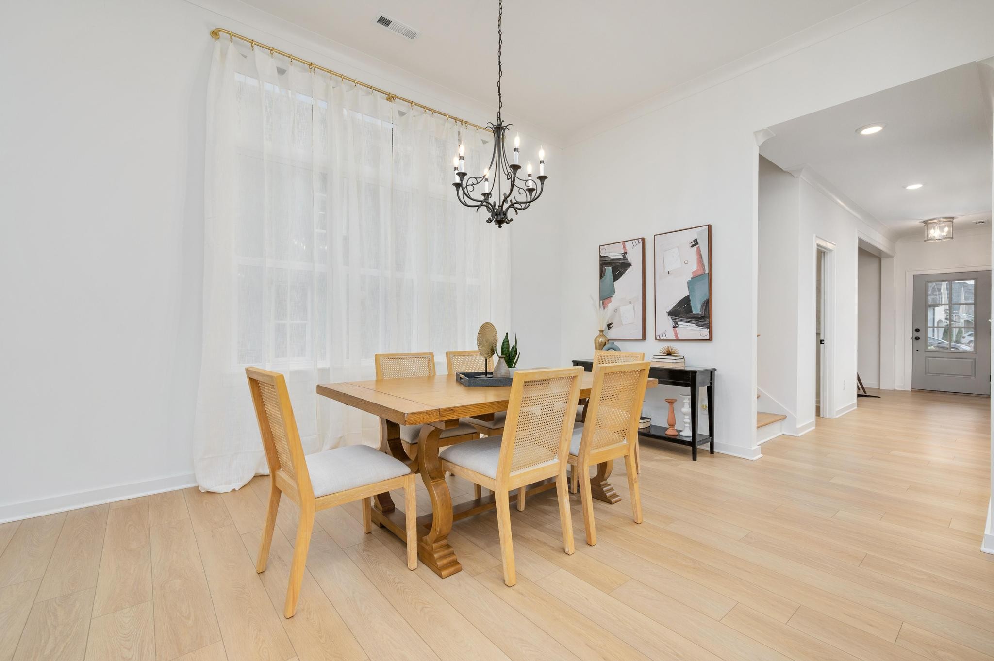 1067 Fallow Road Mount Juliet, TN 37122 - Photo 16 of 47 a view of a dining room with furniture and a chandelier
