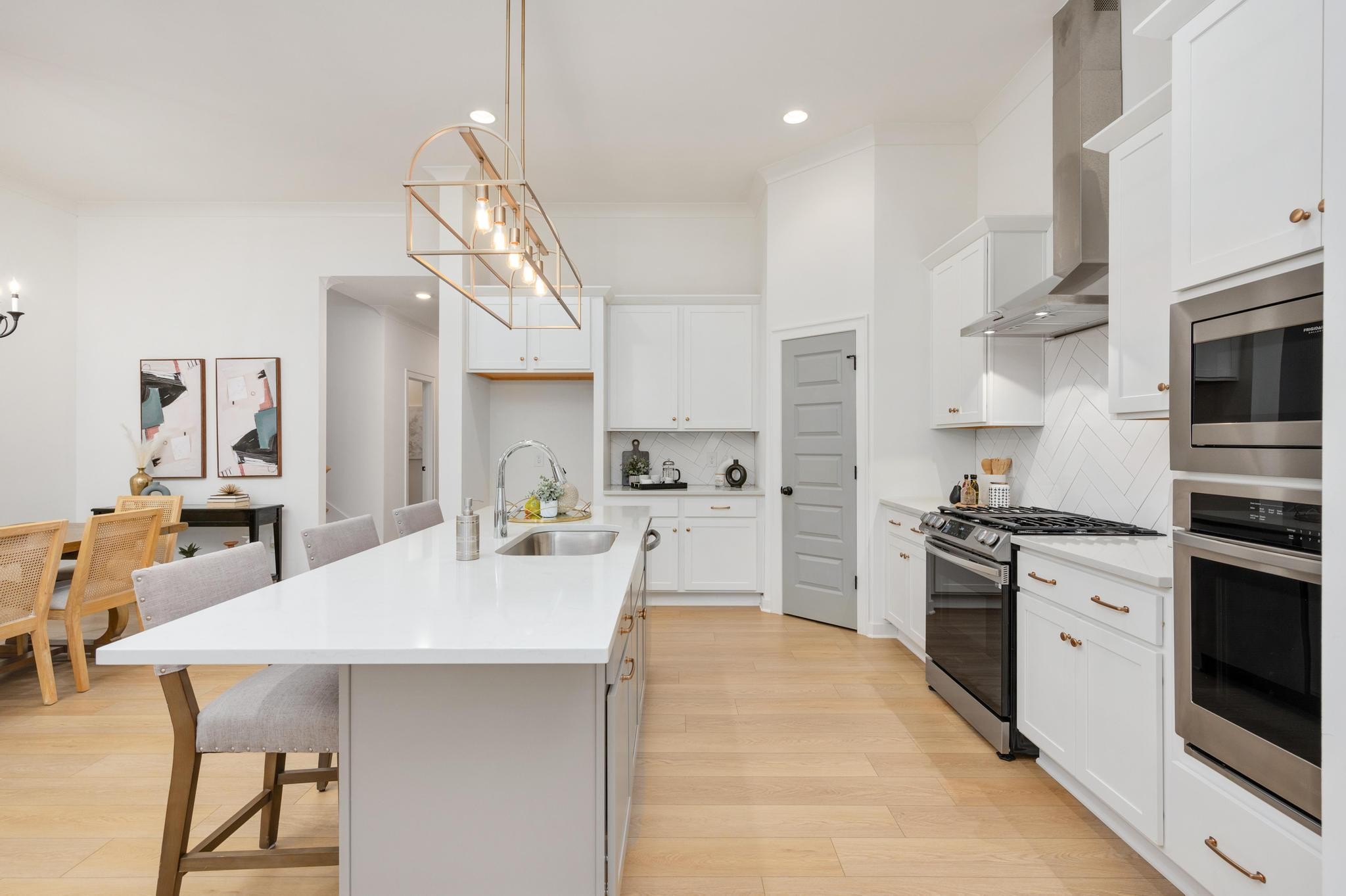 1067 Fallow Road Mount Juliet, TN 37122 - Photo 18 of 47 a kitchen with stainless steel appliances kitchen island granite countertop a sink and cabinets