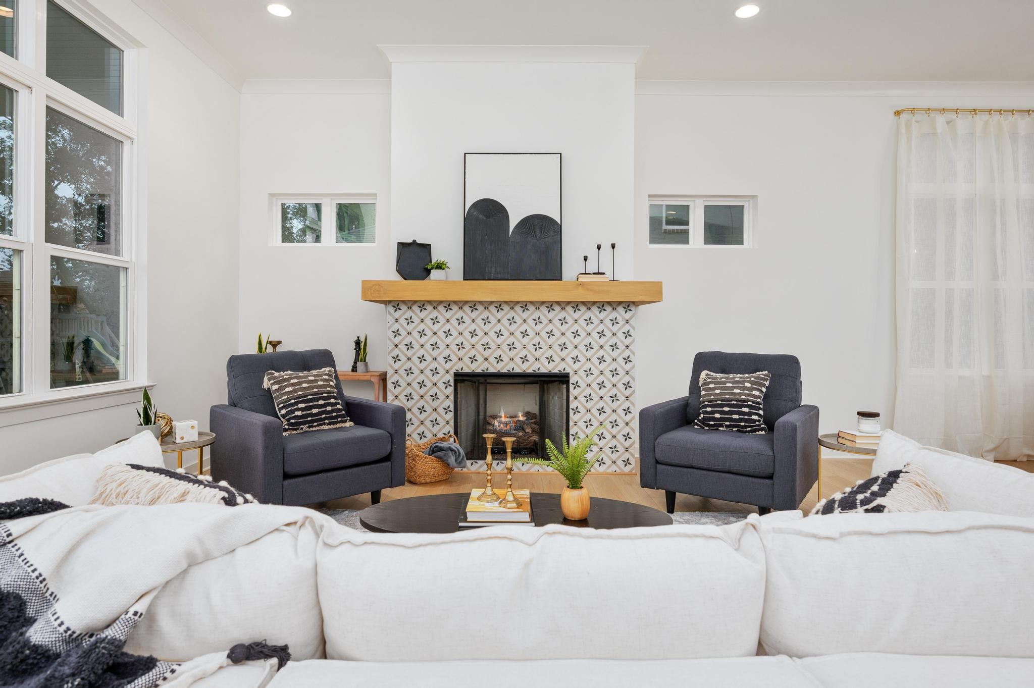 1067 Fallow Road Mount Juliet, TN 37122 - Photo 21 of 47 a living room with furniture and a fireplace