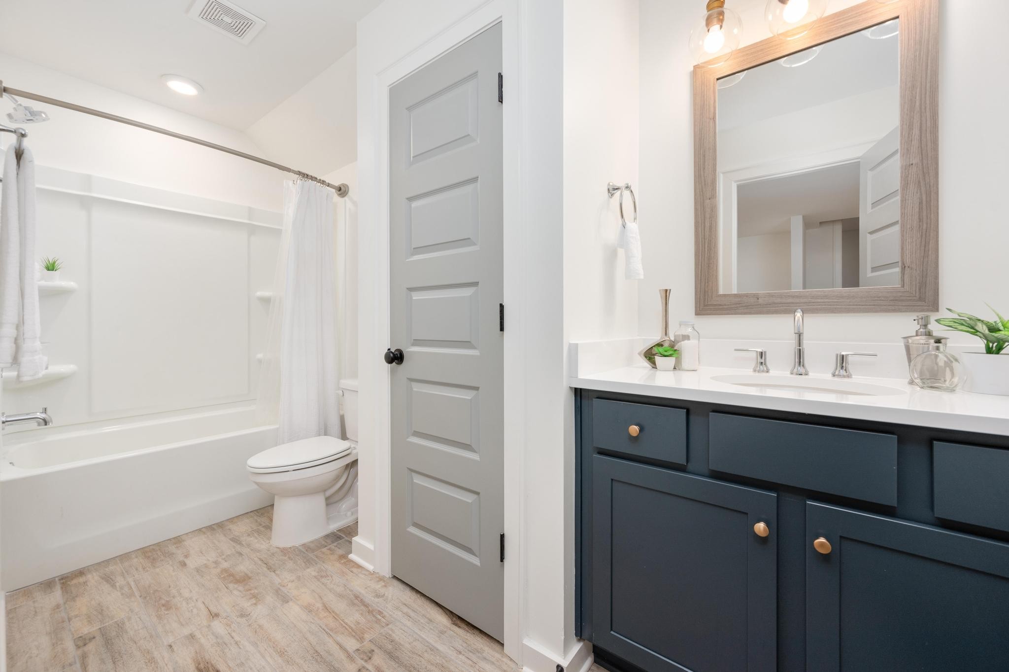 1067 Fallow Road Mount Juliet, TN 37122 - Photo 30 of 47 a bathroom with a sink a toilet and shower