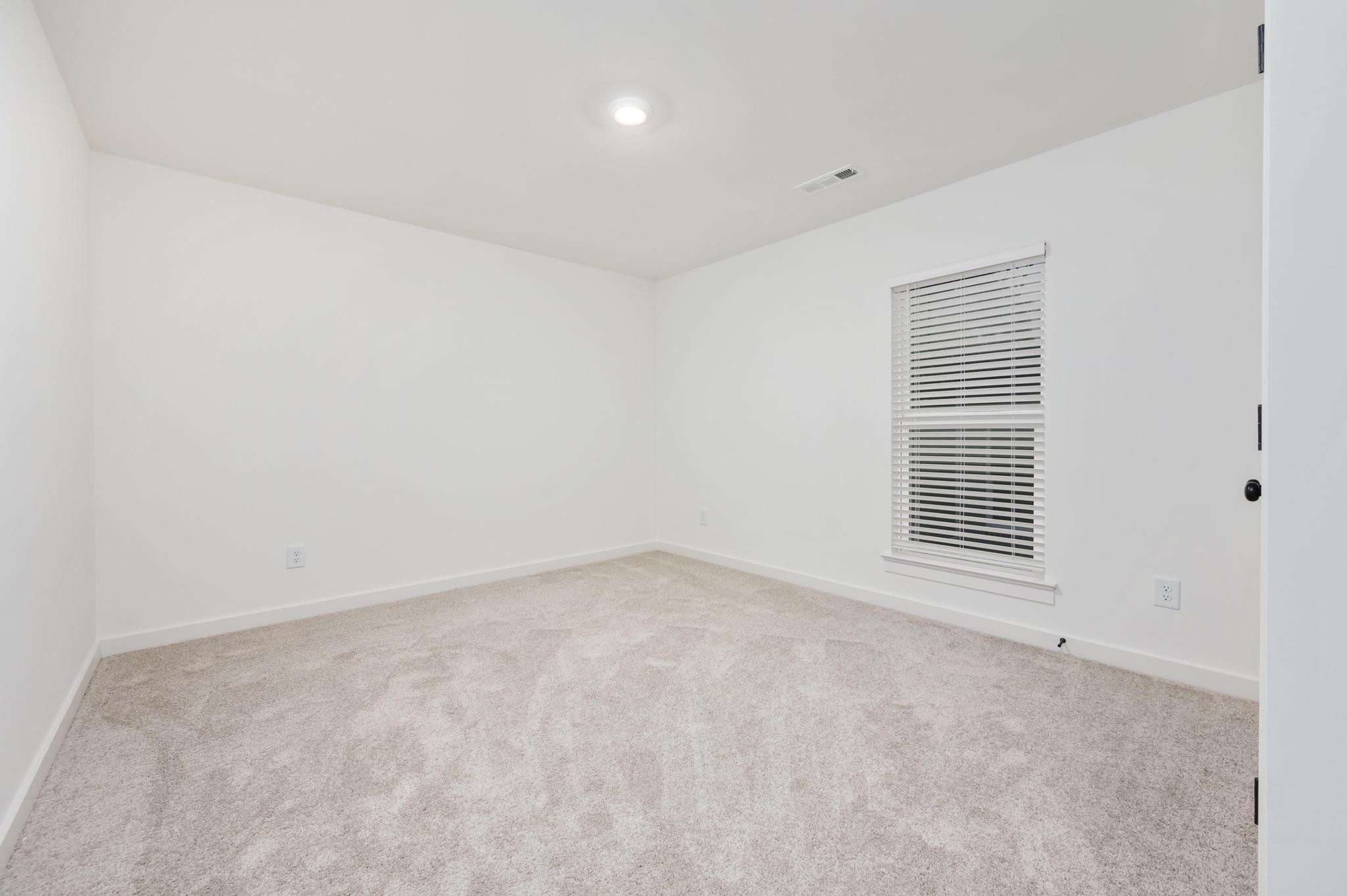 1067 Fallow Road Mount Juliet, TN 37122 - Photo 31 of 47 a view of an empty room with a window