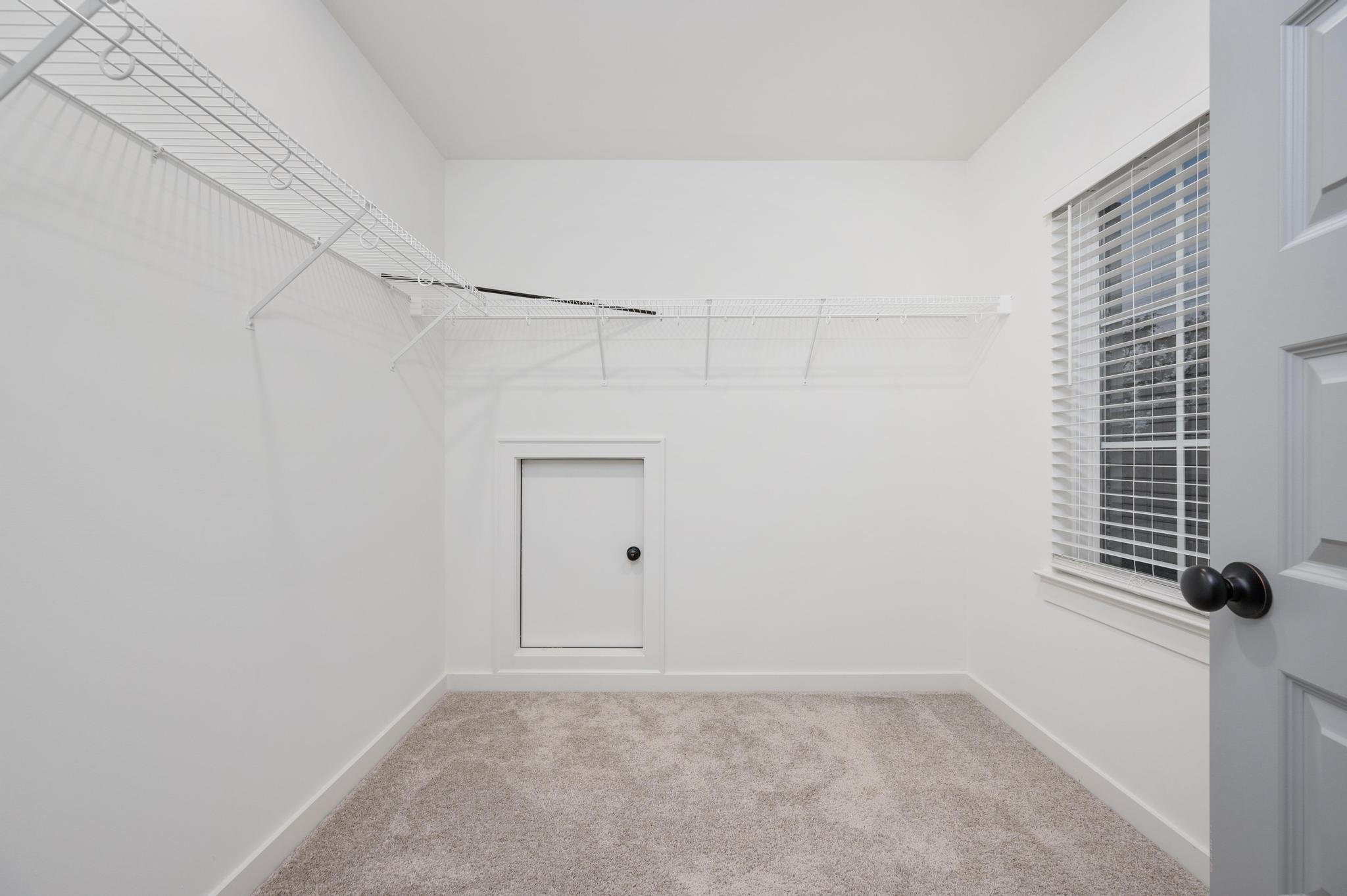 1067 Fallow Road Mount Juliet, TN 37122 - Photo 33 of 47 a view of a room with rack on the wall