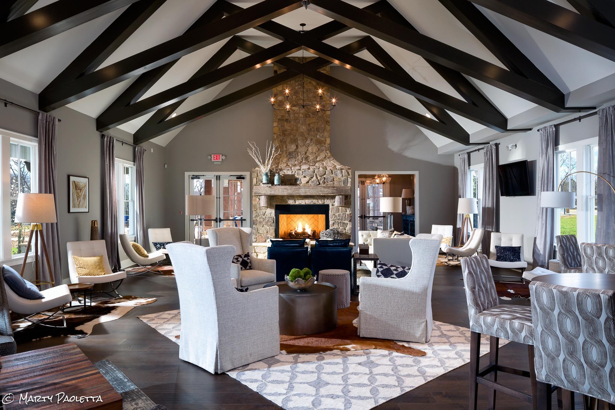 1067 Fallow Road Mount Juliet, TN 37122 - Photo 45 of 47 a living room with furniture a fireplace and a chandelier