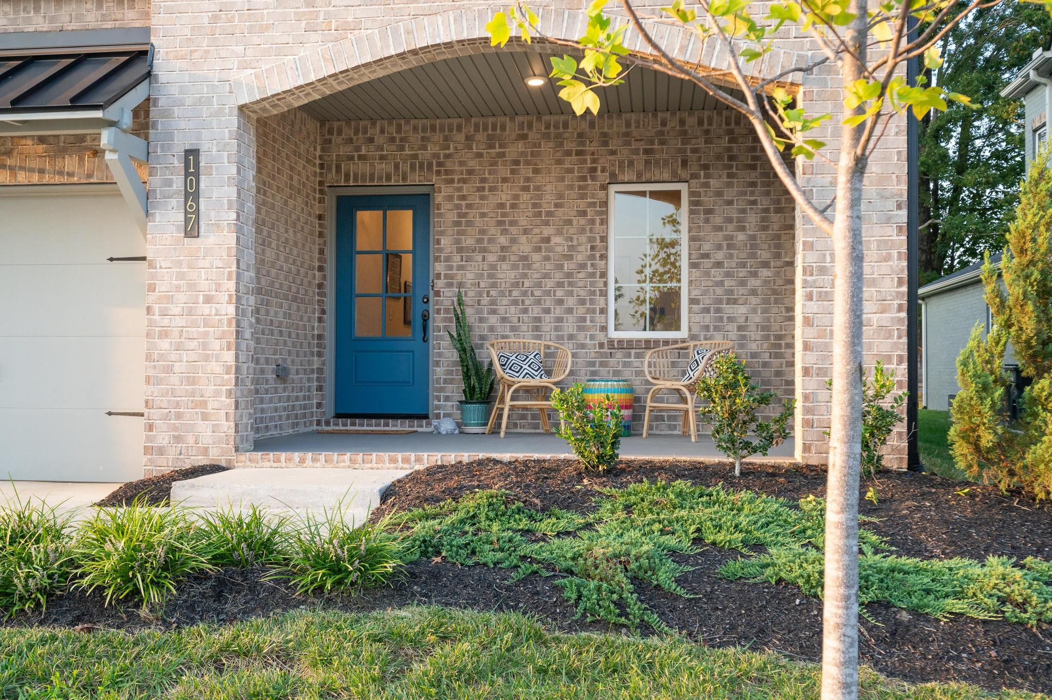 1067 Fallow Road Mount Juliet, TN 37122 - Photo 5 of 47 a front view of a house with garden