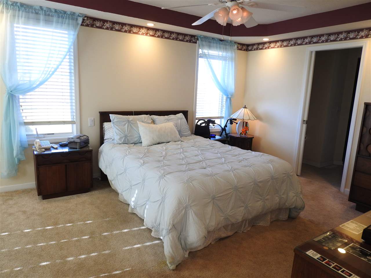 2884 Dourdan Road Belvidere, IL 61008 - Photo 11 of 31 a bed room with a bed and a walk in closet