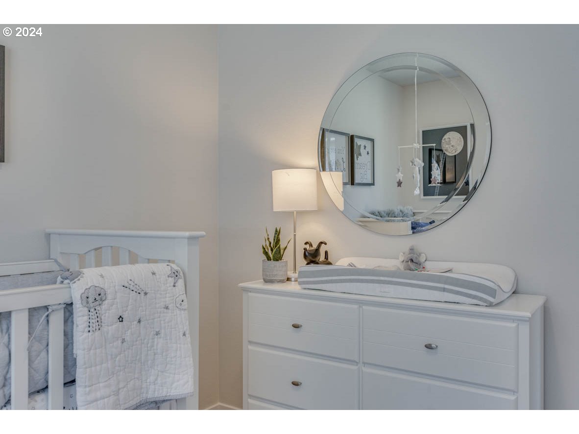 2615 U Street Springfield, OR 97477 - Photo 10 of 14 a bathroom with a sink mirror and vanity