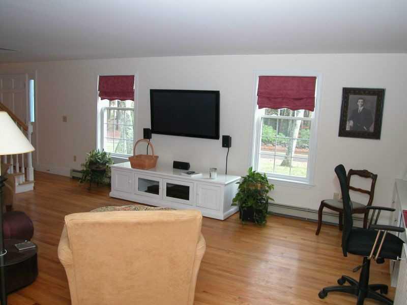 36 Josiah Norton Road York, ME 03902 - Photo 13 of 30 Living Room. The hardwood floors run...
