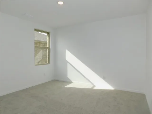 a view of an empty room with window