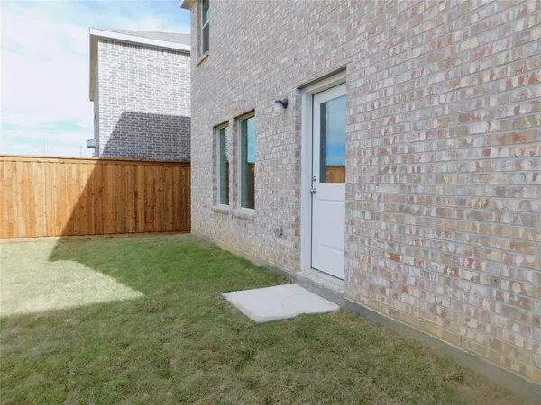 a house view with a backyard