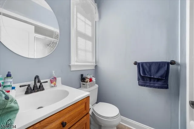 a view of a livingroom with a furniture and a ceiling fan