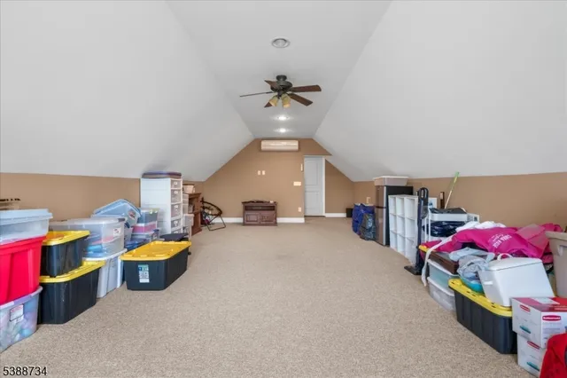 a room with furniture and a flat screen tv