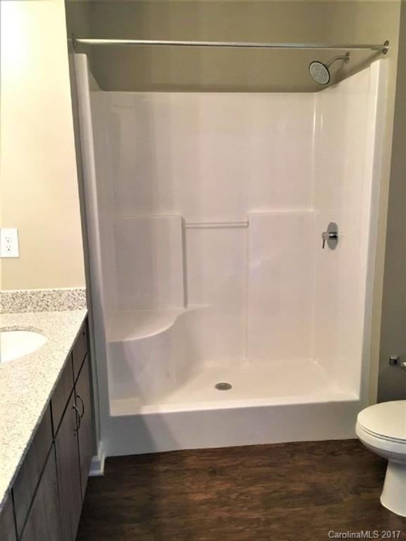 355 Amistead Avenue Fort Mill, SC 29708 - Photo 19 of 23 a bathroom with a bathtub and a shower