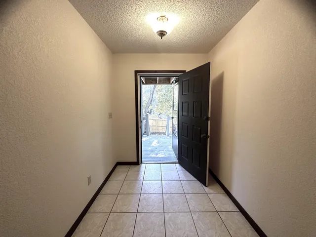 a view of a hallway with entryway