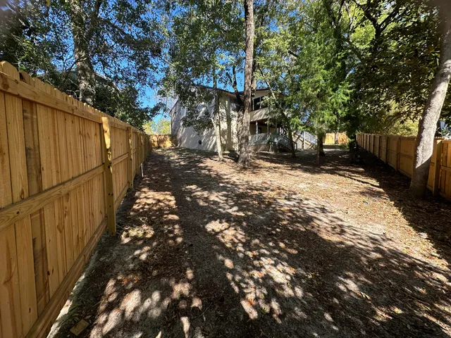 a view of street from balcony