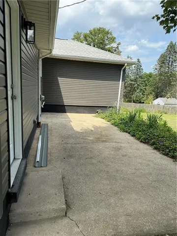 a front view of a house with yard