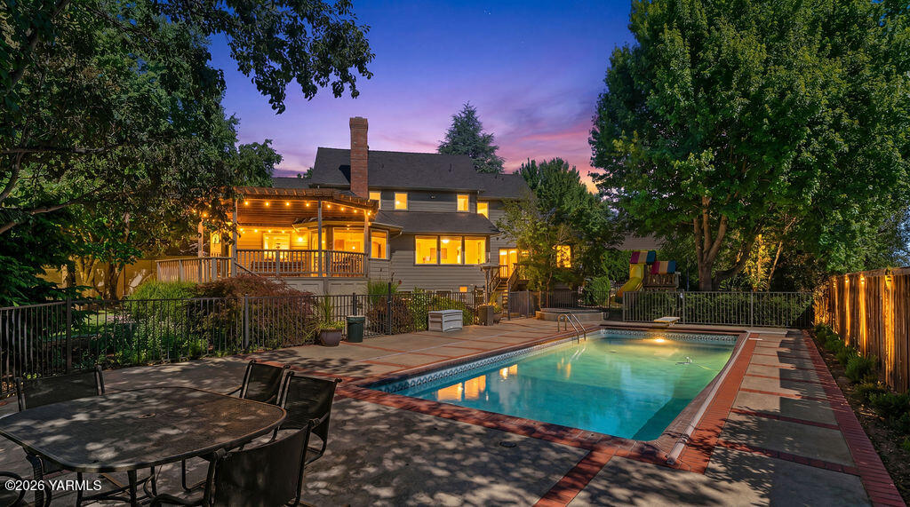 6810 Ravens Gate Way Yakima, WA 98908 - Photo 39 of 45 a view of a swimming pool with a patio