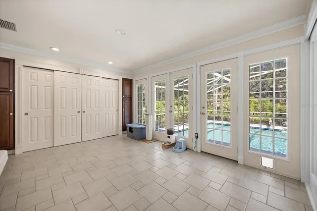 a view of a hallway with washer and dryer