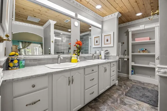 a view of a livingroom with a ceiling fan and a window