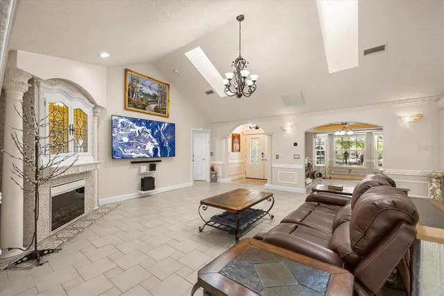 a kitchen with stainless steel appliances granite countertop a stove refrigerator and microwave