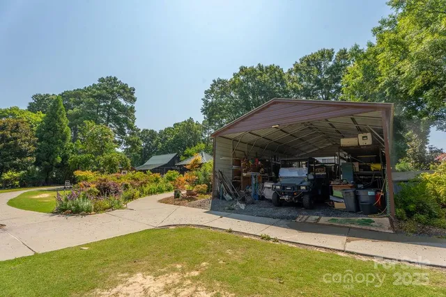 an aerial view of multiple house with yard