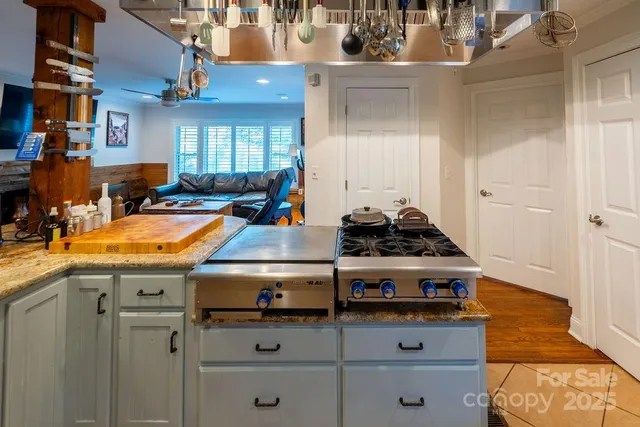 a bedroom with bed and tv
