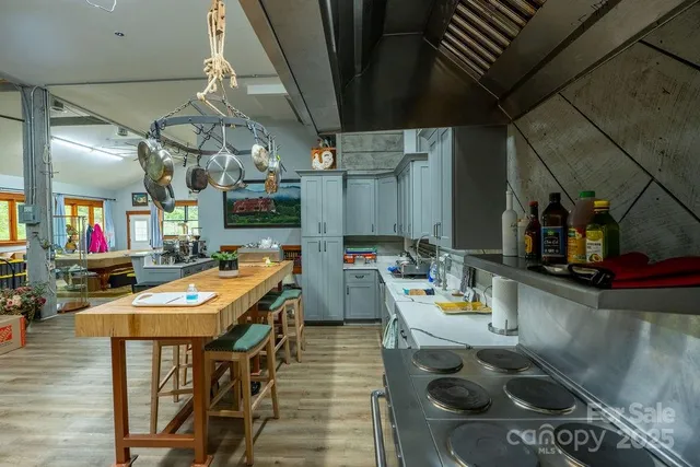 a bedroom with bed and glass windows