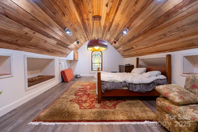 a building outdoor space with patio furniture and potted plants